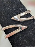 Close-up of ring showing pointed bypass ends