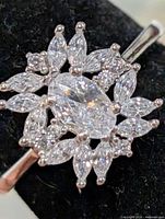 Top view showing cluster of CZ stones and setting details