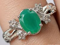 Top view of ring showing green onyx and floral silver setting