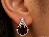 earring worn on ear showing size and design
