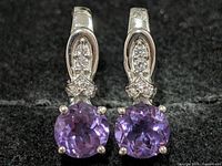 Front view of both silver earrings showing amethyst and CZ stones