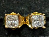 Front view showing both square CZ stones in prong settings