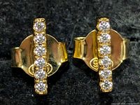 Front view of both earrings showing five CZ stones in vertical bar
