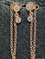 front view of both earrings showing CZ stones and chains