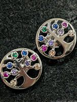 front view of both earrings showing tree design and stones