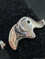 Close-up of elephant head detail on ring