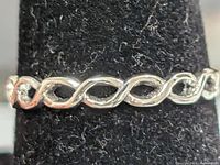 close-up of front of twist design ring