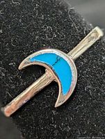 Top view showing crescent turquoise inlay detail