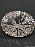 Front view of oval faceted amethyst