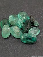 Close-up of emerald stones showing color and cuts