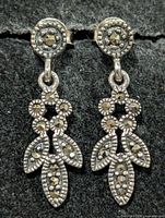 Front view of both dangling marcasite earrings