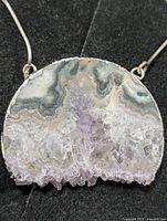 Front view of agate/quartz pendant on silver chain