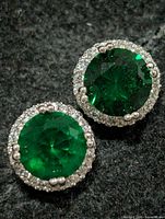 front view showing green stones and CZ halo