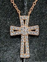 Front view of CZ cross pendant on chain