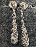 Front view of both earrings showing marcasite setting and drop shape