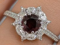 Top view of ring showing garnet center and CZ halo
