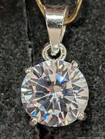 Front view of the CZ pendant showing stone and prongs
