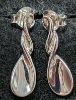front view of both earrings showing design