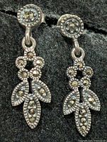 front view of both earrings showing design and stones