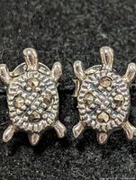 front view of both turtle-shaped marcasite earrings