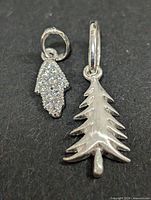 Front view of both pendants showing shapes and finishes