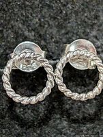 Pair of twisted rope circle stud earrings, backs stamped 925