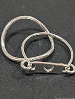 Both sterling silver rings side by side showing overall design