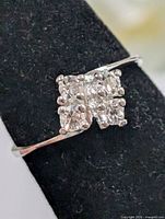 Front view of ring highlighting stone cluster