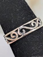 Front view showing scroll pattern on toe ring