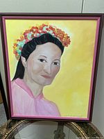 Full view of framed portrait painting of Vietnamese woman