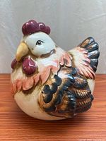full view of ceramic rooster front and side
