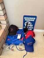 Group shot showing hoodie, three caps, four glasses, parking sign, lanyard