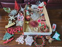 Overview of all ornaments laid out on table and in tray
