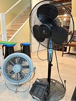Weatherworks pedestal fan, Turbo-Aire Seabreeze floor fan, Super Furnace space heater together