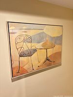 full view of framed art on wall