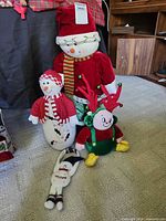 Group shot of all four plush winter items