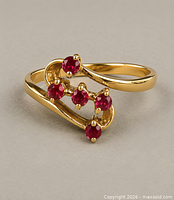 Top view showing bypass design and five rubies