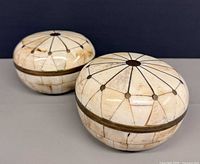 Pair of lidded bone and brass trinket boxes