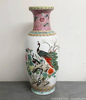 Full front view of porcelain vase showing overall form and decoration
