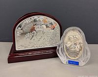 Front view of both items showing designs and size relation