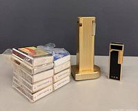 Cygnus lighter, YKK lighter, sealed matchboxes