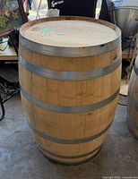 Full view of oak barrel front and side, showing staves and hoops