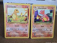 Front view of both Charmander 46/102 and Charmeleon 24/102 cards