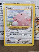Front of Chansey Neo Destiny card on stand