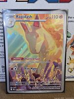 Front view of Rapidash illustration rare card in sleeve