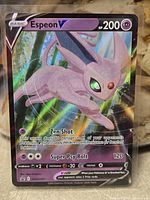 Front of Espeon V card showing artwork and stats