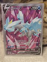 Front of sleeved Kyurem V card showing full art details