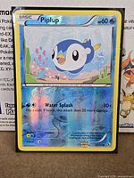 Front of Piplup reverse holo card in sleeve