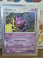 Front of Gengar Lv.43 card showing artwork, text, HP, attacks, 18/100 numbering