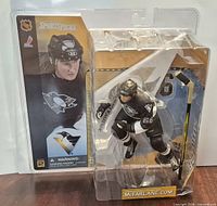 Front view of sealed McFarlane Toys Mario Lemieux figure package